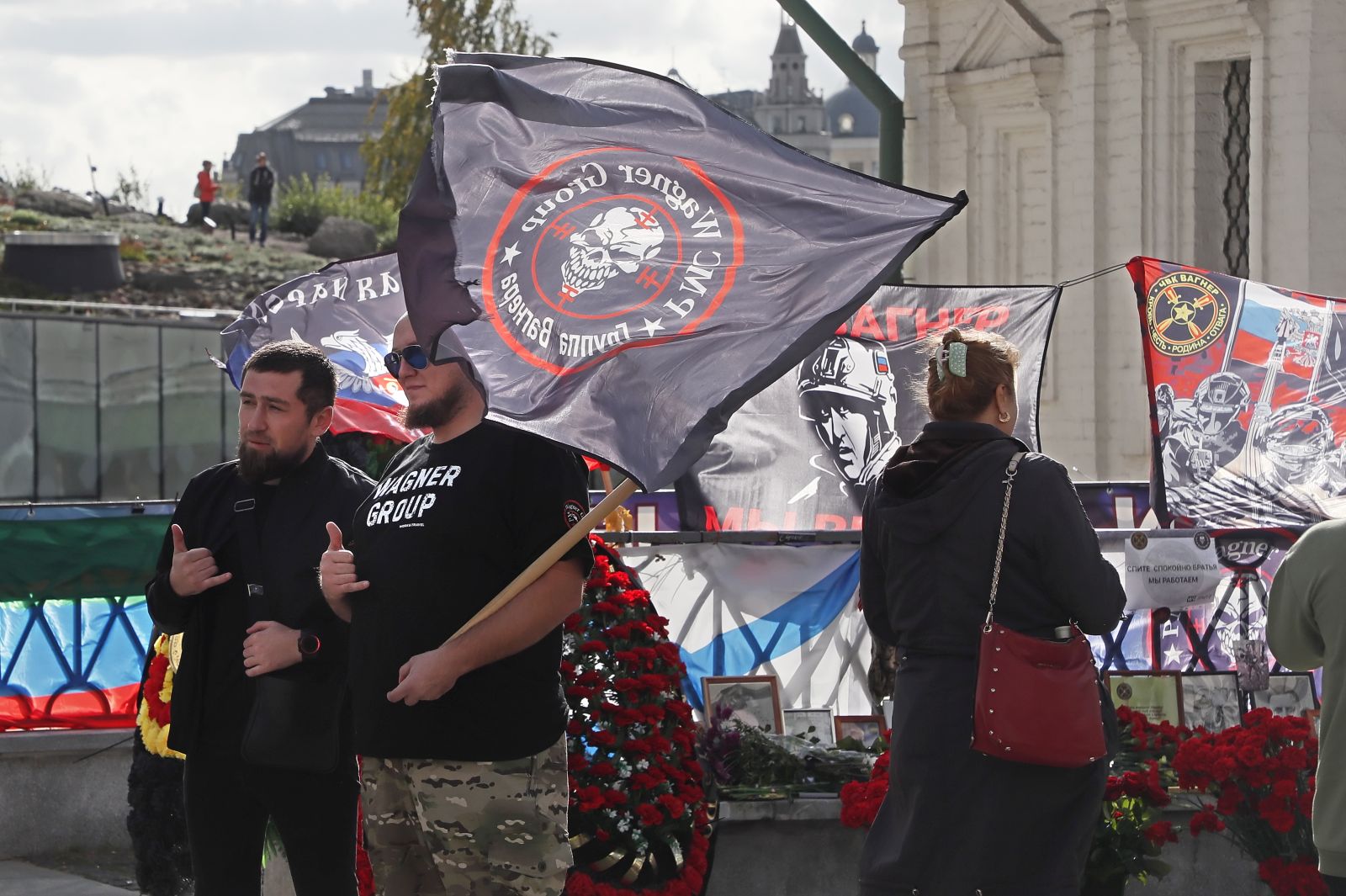 epa10894054 People pay tribute to PMC Wagner Group's late chief Yevgeny Prigozhin at an informal memorial on the 40th day since his death, near the Kremlin in Moscow, Russia, 01 October 2023. Russian authorities on 27 August 2023 confirmed that Prigozhin died along with nine others in the crash of an aircraft in the Tver region of Russia on 23 August 2023. He was buried on 29 August near his father's grave at the Porokhov cemetery on the outskirts of St. Petersburg.  EPA/MAXIM SHIPENKOV