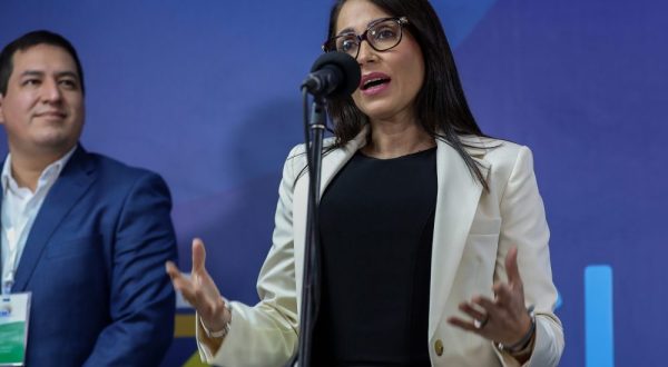epa10894853 Luisa Gonzalez, presidential candidate of the Citizen Revolution movement, speaks upon her arrival at the Ecuador TV headquarters for the 2023 presidential debate, in Quito, Ecuador, 01 October 2023.  EPA/José Jácome