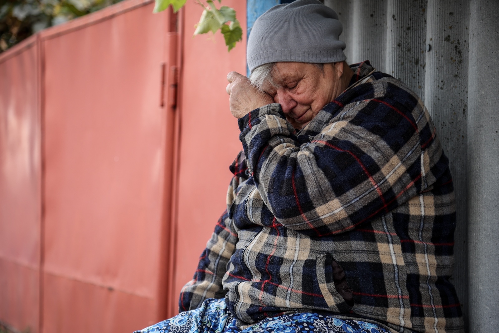 epa10905688 A local resident Alla cries near her home two days after a military strike hit the village of Hroza, Kupiansk district, Kharkiv region, northeastern Ukraine, 07 October 2023.. At least 52 people were killed, including a six-year-old child, and seven others were injured when a Russian missile hit the village on 05 October, as locals gathered to mourn a fallen Ukrainian soldier, the head of the Kharkiv military administration, Oleg Synegubov, said.  EPA/YAKIV LIASHENKO