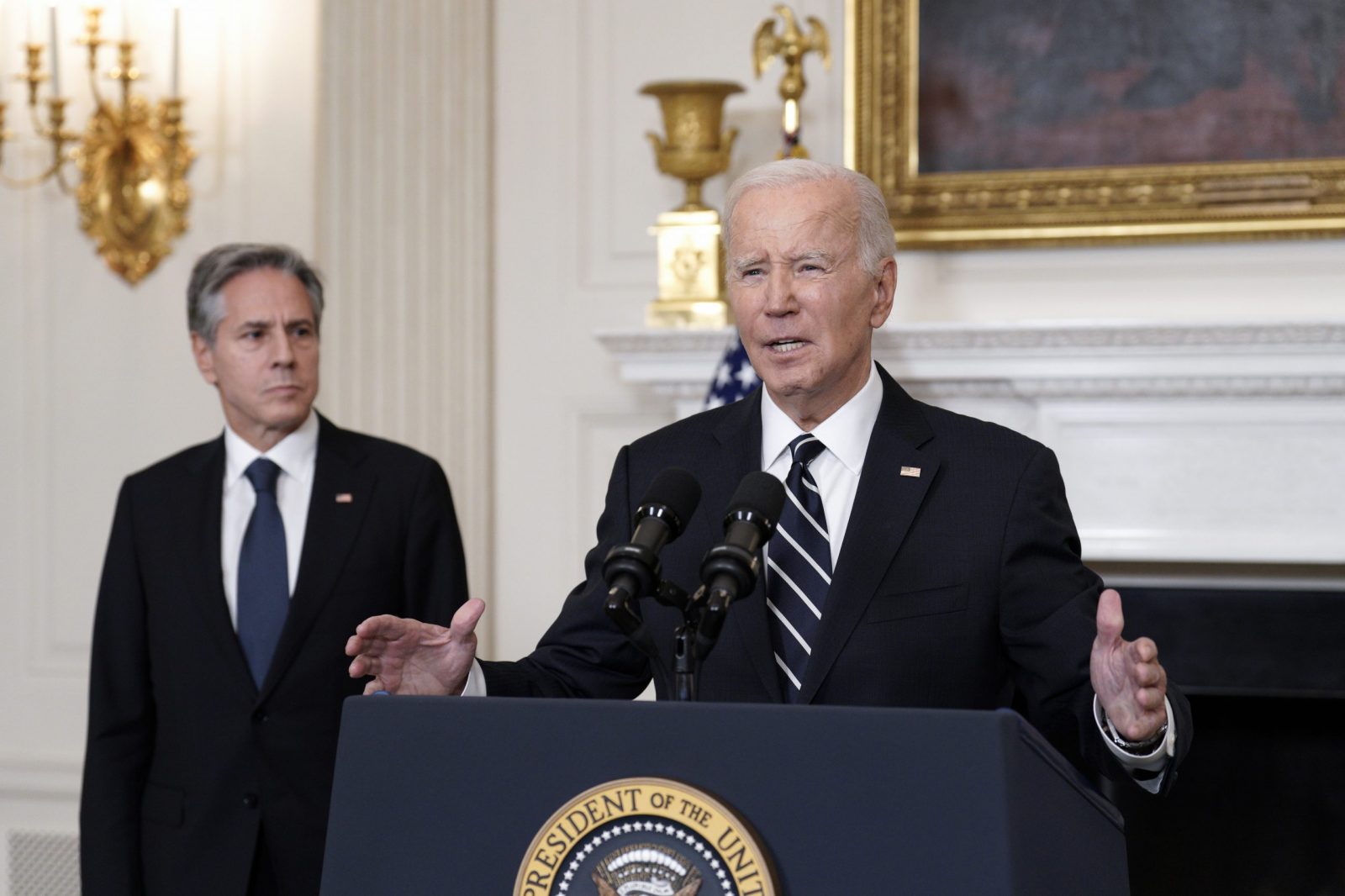 epa10906398 US President Joe Biden with Secretary of State Antony Blinken delivers remarks on the attacks in Israel in the State Dining Room at the White House in  Washington, DC, USA, 07 October 2023. Biden said the United States 'unequivocally condemns this appalling assault against Israel by Hamas terrorists from Gaza', adding that Washington is ready to offer all appropriate means of support to the Government and people of Israel. Rocket barrages were launched from the Gaza Strip early 07 October in a surprise attack claimed by the Islamist movement Hamas. In a televised statement, the Israeli prime minister said the country is at war. Israeli State officials report that at least 22 Israelis were killed in the attacks and that over 3,000 rockets were launched by Hamas.  EPA/Yuri Gripas / POOL