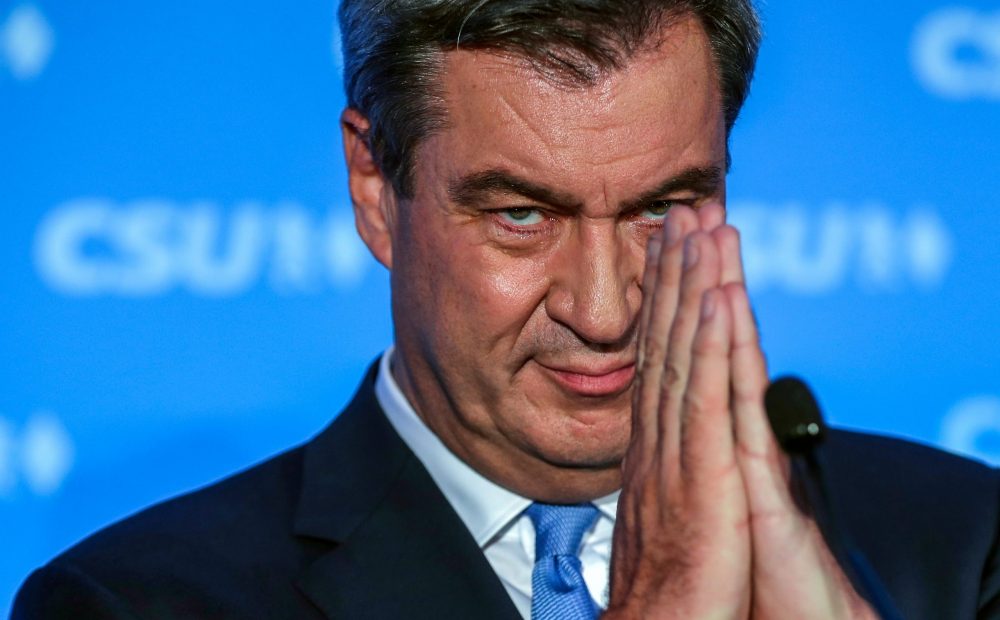 epa10907887 Prime Minister of Bavaria and Christian Social Union (CSU) top candidate Markus Soeder reacts as he delivers a speech during the CSU election party during the Bavarian state and district elections, in Munich, Germany, 08 October 2023. Voters in the German states of Bavaria and Hesse head to the polls on 08 October to elect new parliaments.  EPA/LEONHARD SIMON