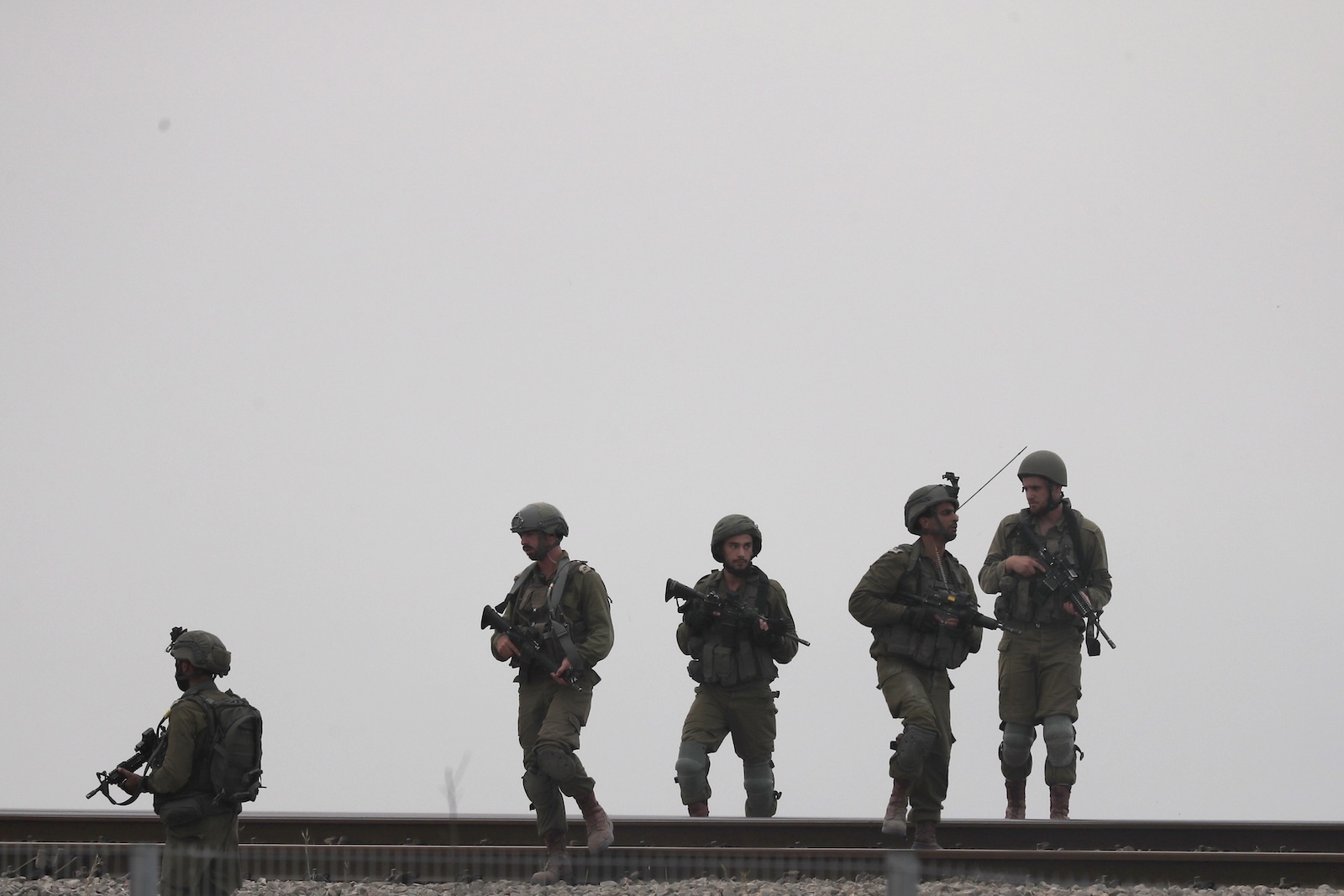 epa10908724 Israeli soldiers patrol the area next to the  border with Gaza, near Sderot, southern Israel, 09 October 2023. The Israeli army announced on 09 October, it carried out over 500 strikes on targets across the Gaza Strip overnight. An unprecedented attack on southern Israel on 07 October claimed by the Islamist movement Hamas killed more than 700 Israelis and left over 2,150 injured, the Israeli army said. In retaliation, Israeli announced operation 'Swords of Iron' against the militant group in the Gaza Strip.  EPA/ATEF SAFADI