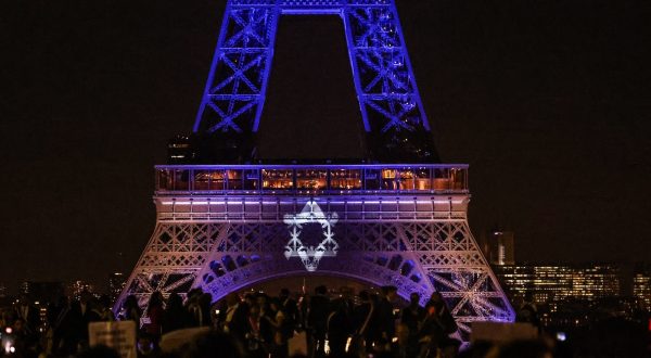 epa10910386 The Eiffel Tower lights up in colors of Israeli flag during a rally in support of Israel in Paris, France, 09 October 2023. More than 700 Israelis were killed and over 2,000 were injured since the Islamist movement Hamas carried out an unprecedented attack on southern Israel on 07 October, the Israeli army said. According to Palestinian officials, more than 700 people were killed and nearly 4,000 were injured as a result of Israelâ€™s retaliatory raids and air strikes in the Palestinian enclave.  EPA/MOHAMMED BADRA