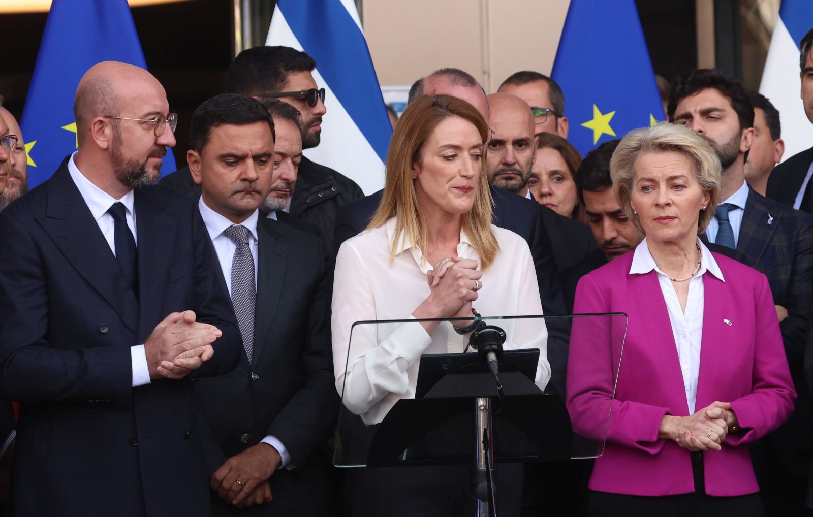 epa10912918 European Council President Charles Michel (L), European Parliament President Roberta Metsola (C), European Commission President Ursula von der Leyen (R) as well as Members  of the European Parliament take part at Solemn Moment in solidarity with the victims of the terror attacks in Israel, at the European Parliament Esplanade in Brussels, Belgium, 11 October 2023.  EPA/OLIVIER HOSLET