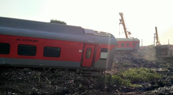 epa10914628 Rescue works continue at the site of a train accident after the 12506 Delhi-Kamakhya North East Express train derailed near the Raghunathpur station in Bihar's Buxar district, India, 12 October 2023. At least four people were killed and nearly 100 injured after the derailment happened at the Raghunathpur railway station, railway officials said.  EPA/ASHUTOSH KUMAR PANDEY