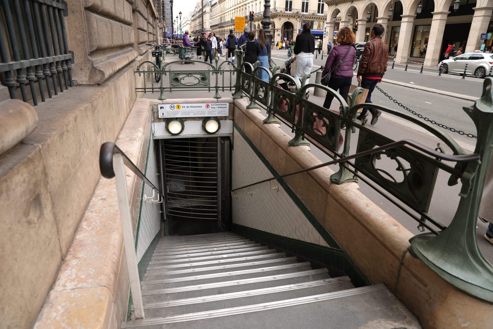 epa10918820 People walk past the closed entrance to Louvre- Palais Royal metro station in Paris, France, 14 October 2023. The Louvre and other tourist locations were evacuated in Paris following a reported bomb threat. In a statement posted on 'X', the social media site formerly known as Twitter, the museum announced it was closing for security reasons on 14 October. The French president raised its national security alert system to a high level and mobilized 7,000 troops for increased security in response to a knife attack at a school in Arras, where a teacher was fatally stabbed to death and two others seriously injured on 13 October 2023.  EPA/TERESA SUAREZ