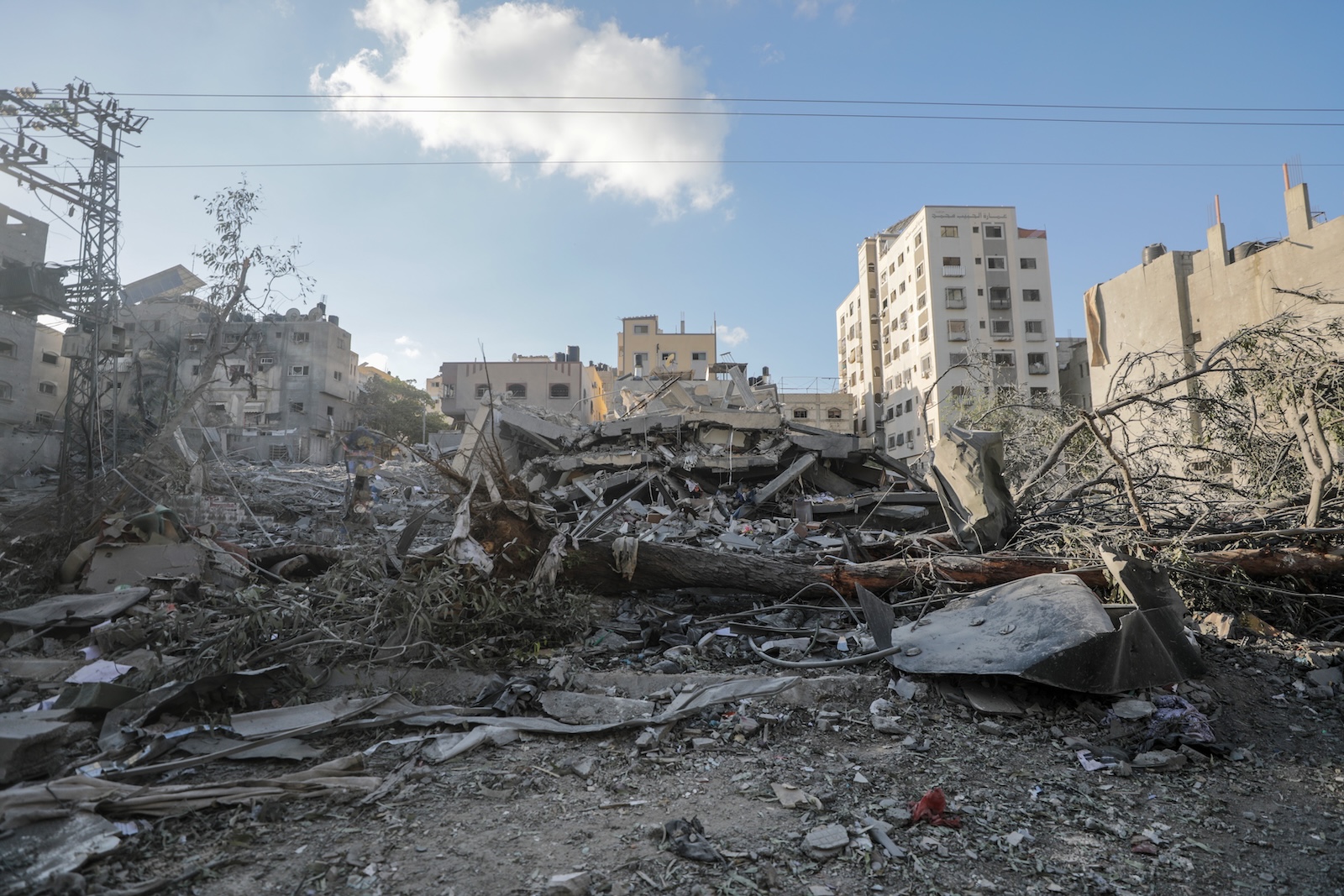 epa10920600 Destroyed houses seen following Israeli strikes in the Gaza strip, 15 October 2023. The Israel Defense Force (IDF) on 14 October announced they are increasing readiness and preparing to 'implement a wide range of operational offensive plans', including combined and coordinated strikes by land, sea and air. Israel has called for the evacuation of all civilians of northern Gaza ahead of an expected ground invasion. More than 1,300 Israelis have been killed and over 3,200 others injured, according to the IDF, after the Islamist movement Hamas launched an attack against Israel from the Gaza Strip on 07 October. More than 2,300 Palestinians have been killed and over 9,000 others injured in Gaza since Israel launched retaliatory air strikes, the Palestinian health ministry said.  EPA/MOHAMMED SABER