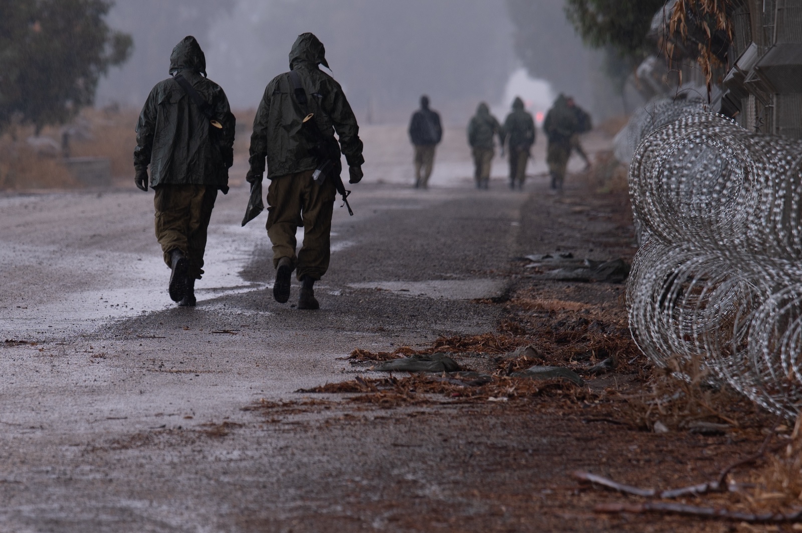 epa10922342 Israeli soldiers at an area near the border with Lebanon, in the Upper Galilee, northern Israel, 16 October 2023. Israel's National Emergency Management Authority (NEMA) of the Ministry of Defense and the Israel Defense Force (IDF) announced on 16 October the implementation of a plan to evacuate residents of 28 communities in northern Israel, who live in the area up to two kilometers from the Lebanese border. The residents would be taken to state-funded guesthouses. The announcement came a day after the United Nations Interim Force in Lebanon (UNIFIL) said intense exchanges of fire occurred in several areas along the Blue Line between Lebanese territory and Israel, which impacted both sides of the demarcation line. Tensions remain high on the Lebanon-Israel border following an escalation in fighting between the two countries as the Israeli-Palestinian conflict flared up.  EPA/AYAL MARGOLIN ISRAEL OUT