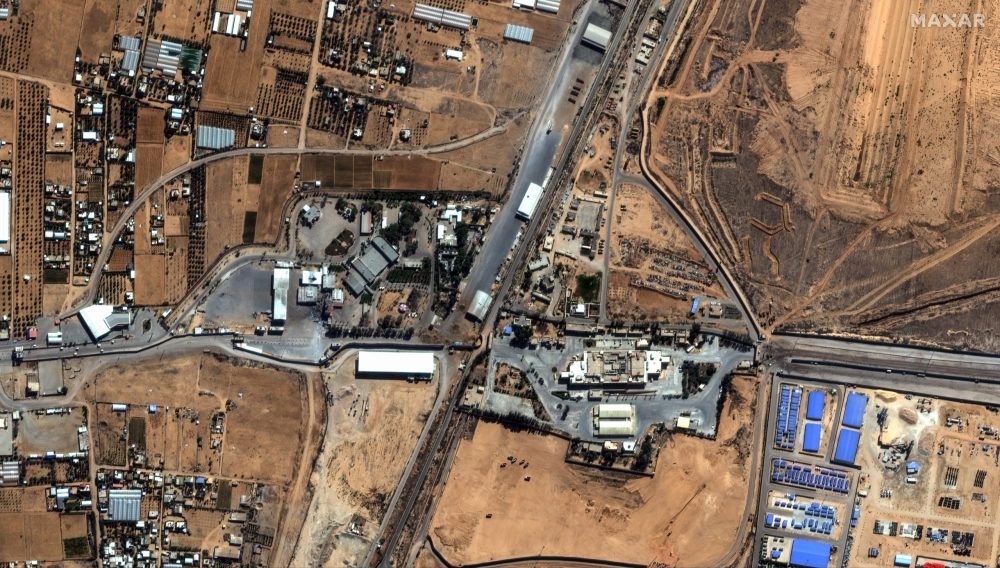 epa10922896 A handout photo made available 17 October 2023 by Maxar Technologies shows an overview of Gaza's Rafah border crossing leading to Egypt, 15 October 2023. Israel has warned all citizens of the Gaza strip to move to the south ahead of an expected invasion. More than 2,750 Palestinians and 1,300 Israelis have been killed according to the IDF and Palestinian health ministry, after Hamas militants launched an attack against Israel from the Gaza Strip on 07 October.  EPA/MAXAR TECHNOLOGIES Satellite image ©2023 Maxar Technologies HANDOUT EDITORIAL USE ONLY/NO SALES HANDOUT EDITORIAL USE ONLY/NO SALES
