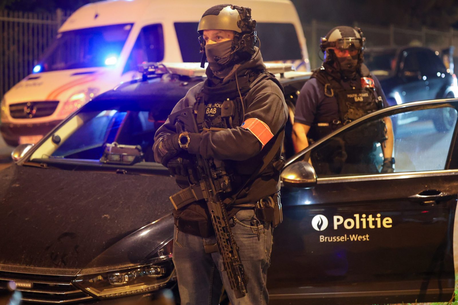 epa10922707 Police forces secure the area while fans are evacuated from the stadium after the UEFA the UEFA EURO 2024 group F qualification round match between Belgium and Sweden was stopped in Brussels, Belgium, 16 October 2023. The match was suspended and then abandoned due to a terrorist attack by a gunman that killed two Swedes elsewhere in Brussels.  EPA/OLIVIER MATTHYS