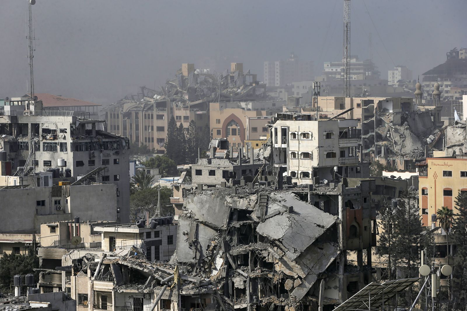 epa10932282 Destroyed buildings in Al Remal neighbourhood after Israeli airstrikes on Gaza City, 22 October 2023. More than 4,000 Palestinians and 1,400 Israelis have been killed, according to the Israel Defense Forces (IDF) and the Palestinian health authority, since Hamas militants launched an attack against Israel from the Gaza Strip on 07 October. After 20 aid trucks were allowed into the Gaza strip on 21 October through the Rafah border crossing with Egypt, various UN agencies expressed the hope that some more aid could be allowed into Gaza on 22 October.  EPA/MOHAMMED SABER