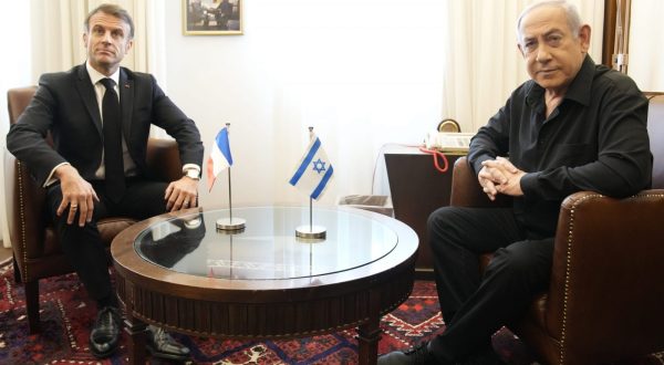 epa10935447 Israeli Prime Minister Benjamin Netanyahu (R) meets with French President Emmanuel Macron in Jerusalem, 24 October 2023. Macron is traveling to Israel to show France's solidarity with the country and further work on the release of hostages who are being held in Gaza.  EPA/CHRISTOPHE ENA / POOL MAXPPP OUT