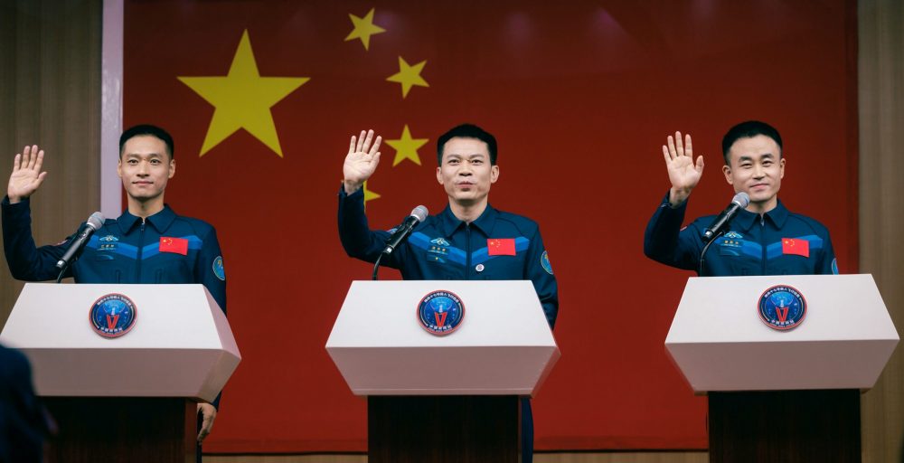 epa10937506 Astronauts of Shenzhou-17 spaceflight mission Tang Hongbo (C), Tang Shengjie (R), and Jiang Xinlin attend a press conference in Jiuquan, Gansu province, China, 25 October 2023. The Shenzhou-17 is the second manned spaceflight mission of the China Space Station's development phase, expected to last for about six months, with the crew carrying out installation, maintenance, repair and experimental tasks in space.  EPA/ALEX PLAVEVSKI