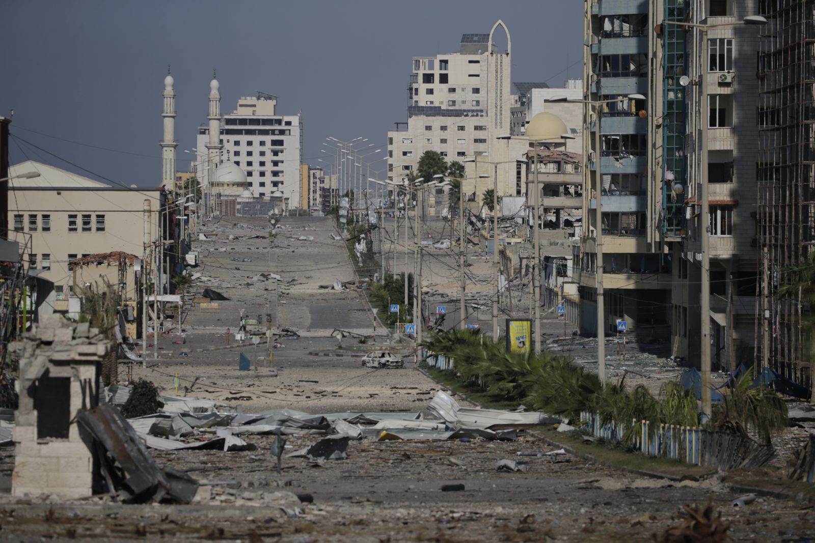 epa10940796 Debris in a deserted street following Israeli air strikes in Gaza City on 26 October 2023. More than 6,500 Palestinians and at least 1,300 Israelis have been killed, according to the Israel Defense Forces (IDF) and the Palestinian health authority, since Hamas militants launched an attack against Israel from the Gaza Strip on 07 October, and the Israeli operations in Gaza and the West Bank which followed it.  EPA/MOHAMMED SABER