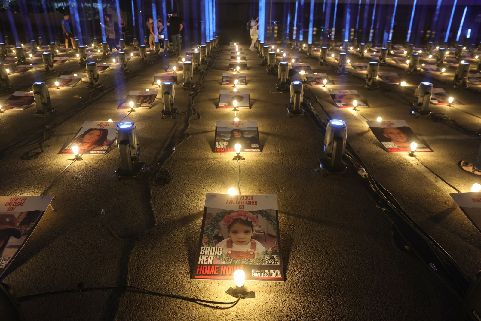 epa10941434 224 light projectors signifying those abducted by Hamas, light the sky near the Arena sports hall in Jerusalem, Israel, 26 October 2023. According to the Israel Defence Forces (IDF), more than 224 people were taken hostage by Hamas on 07 October, when the militant group launched an unprecedented attack on Israel from the Gaza Strip.  EPA/ABIR SULTAN