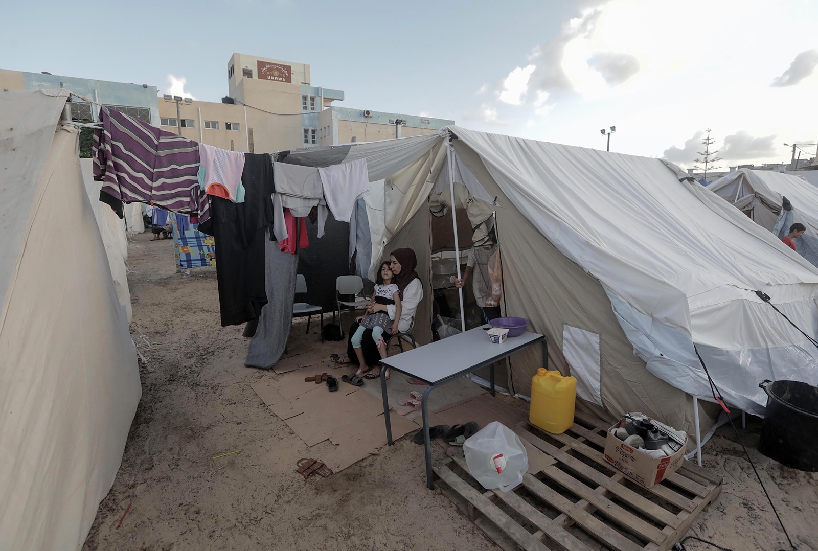 epa10927755 Palestinians displaced by the Israeli bombardment of the Gaza Strip at a UNDP-provided tent camp in Khan Younis, 19 October 2023. According to the United Nations Office for the Coordination of Humanitarian Affairs (OCHA), the number of internally displaced people (IDPs) in Gaza was estimated at about one million, including around 513,500 IDPs taking shelter at UNRWA facilities across the Gaza Strip. More than 3,700 Palestinians and 1,400 Israelis have been killed according to the Israel Defense Forces (IDF) and the Palestinian Health authority since Hamas militants launched an attack against Israel from the Gaza Strip on 07 October. Israel has warned all citizens of the Gaza Strip to move to the south ahead of an expected invasion.  EPA/HAITHAM IMAD
