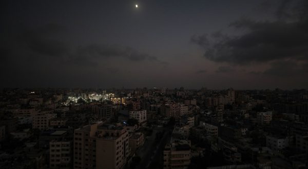 epa10936620 Al Shifa hospital is lit up in Gaza City 24 October 2023. The Health Ministry in Gaza warned that electric generators in hospitals will cease functioning within days due to a fuel shortage and that 32 health centers are out of service due to targeting by Israeli warplanes and a fuel shortage. More than 5,000 Palestinians and over 1,400 Israelis have been killed, according to the Israel Defense Forces (IDF) and the Palestinian health authority, since Hamas militants launched an attack against Israel from the Gaza Strip on 07 October.  EPA/MOHAMMED SABER