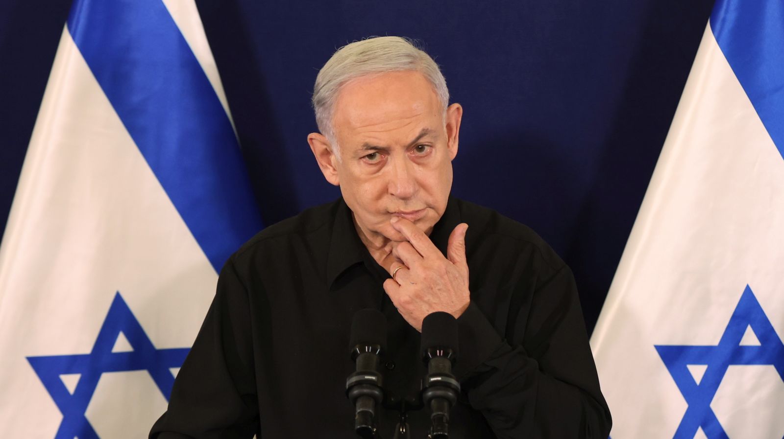 epa10945783 Israel's Prime Minister Benjamin Netanyahu addresses a press conference in The Kirya military base in Tel Aviv, Israel, 28 October 2023.  EPA/ABIR SULTAN / POOL
