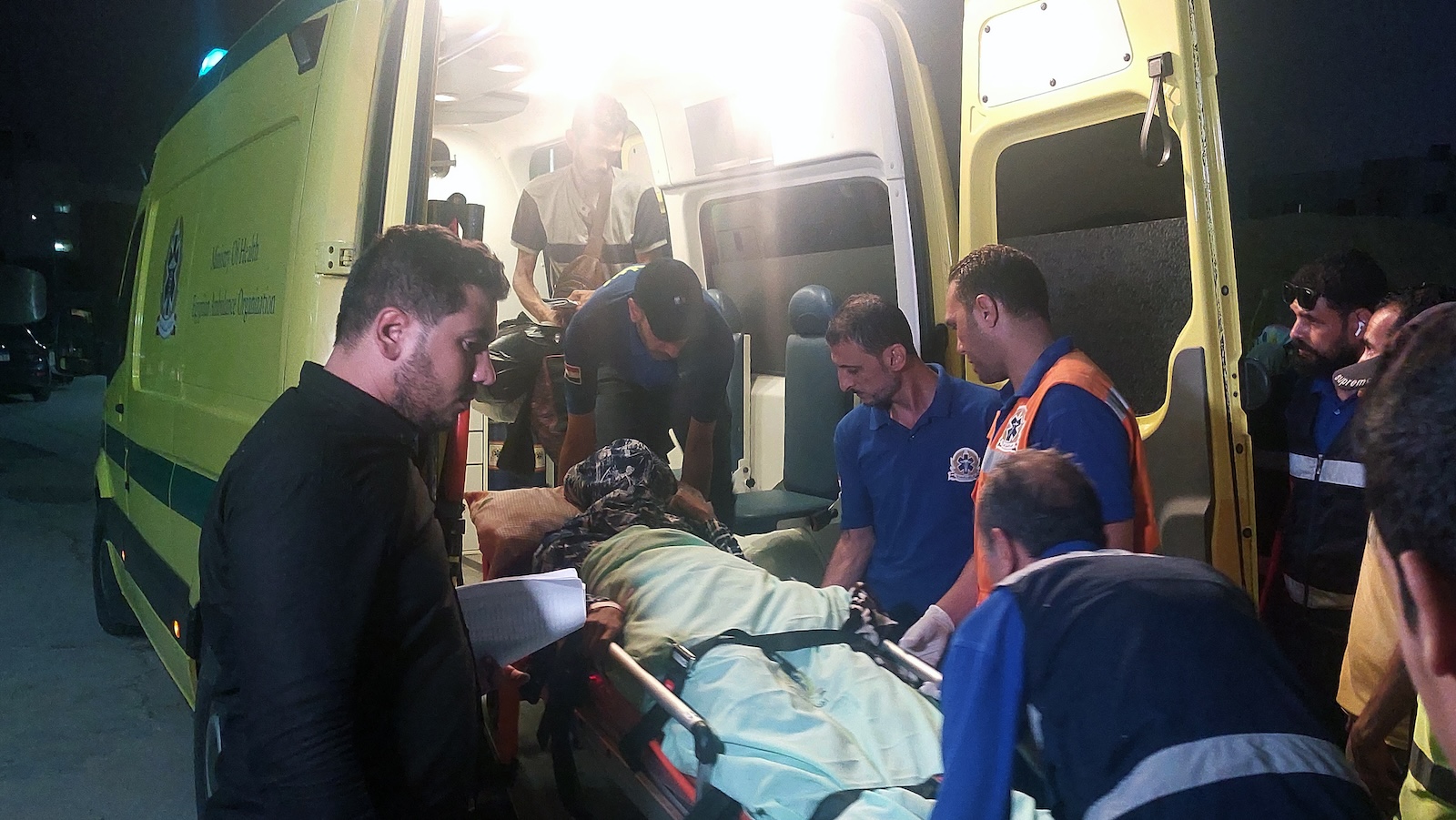 epa10953027 Health personnell carry an injured evacuee from Gaza on a stretcher at a hospital in Arish, Egypt, 01 November 2023. Ambulances carrying evacuees from the Gaza Strip were driven through the border crossing at Rafah on 01 November. As per the agreement made by Egypt, Israel, and Hamas, a number of foreign nationals and individuals with critical injuries will be permitted to evacuate the besieged territory. More than 8,500 Palestinians and at least 1,400 Israelis have been killed, according to the Israel Defense Forces (IDF) and the Palestinian health authority, since Hamas militants launched an attack against Israel from the Gaza Strip on 07 October, and the Israeli operations in Gaza and the West Bank which followed it.  EPA/KHALED ELFIQI