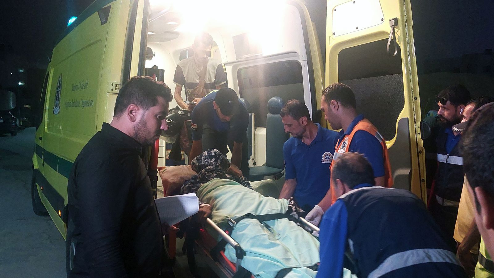 epa10953027 Health personnell carry an injured evacuee from Gaza on a stretcher at a hospital in Arish, Egypt, 01 November 2023. Ambulances carrying evacuees from the Gaza Strip were driven through the border crossing at Rafah on 01 November. As per the agreement made by Egypt, Israel, and Hamas, a number of foreign nationals and individuals with critical injuries will be permitted to evacuate the besieged territory. More than 8,500 Palestinians and at least 1,400 Israelis have been killed, according to the Israel Defense Forces (IDF) and the Palestinian health authority, since Hamas militants launched an attack against Israel from the Gaza Strip on 07 October, and the Israeli operations in Gaza and the West Bank which followed it.  EPA/KHALED ELFIQI