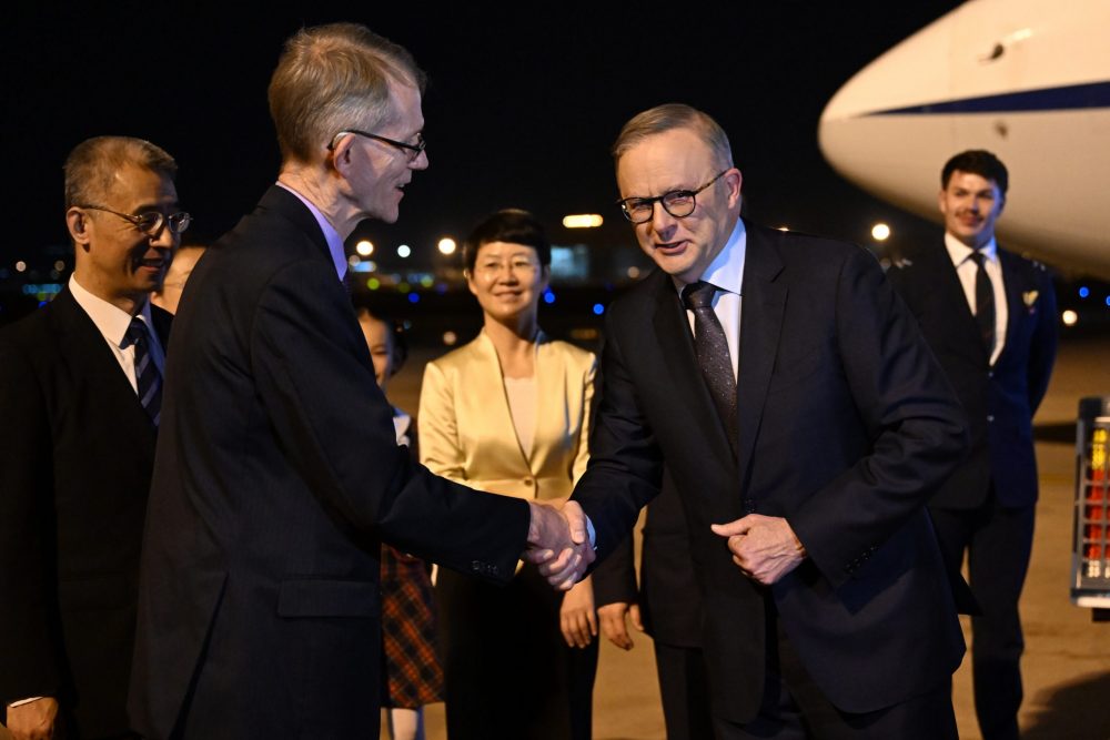 epa10957108 Australia's Ambassador to China Graham Fletcher greets Australia’s Prime Minister Anthony Albanese (R) after arriving at Hongqiao Airport in Shanghai, China, 04 November 2023. Anthony Albanese will hold talks in China with President Xi Jinping in the first visit to the Asian nation by a sitting prime minister since 2016.  EPA/LUKAS COCH AUSTRALIA AND NEW ZEALAND OUT