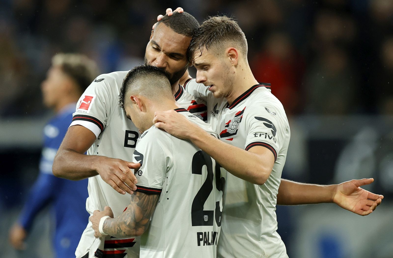 epa10957779 Leverkusen players celebrate after winning the German Bundesliga soccer match between TSG 1899 Hoffenheim and Bayer 04 Leverkusen in Sinsheim, Germany, 04 November 2023.  EPA/RONALD WITTEK CONDITIONS - ATTENTION: The DFL regulations prohibit any use of photographs as image sequences and/or quasi-video.