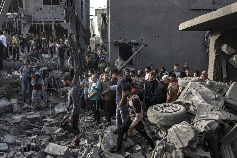 epaselect epa10959086 Palestinians search for bodies and survivors among the rubble of a residential building following an airstrike at the Maghazi refugee camp in the central Gaza Strip, 05 November 2023. More than 9,400 Palestinians and at least 1,400 Israelis have been killed, according to the IDF and the Palestinian health authority, since Hamas militants launched an attack against Israel from the Gaza Strip on 07 October, and the Israeli operations in Gaza and the West Bank which followed it.  EPA/HAITHAM IMAD
