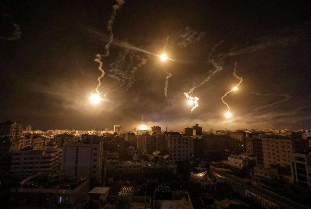 epa10962788 Israeli army flares illuminate the sky over west Gaza in the northern Gaza Strip, on 06 November 2023. (Issued 07 November 2023). 07 November 2023, marks one month since Hamas militants launched an attack against Israel from the Gaza Strip, which was followed by Israeli operations in Gaza and the West Bank. More than 10,000 Palestinians and at least 1,400 Israelis have been killed and more than 200 others were taken hostage by Hamas militants, according to the Palestinian health authority and  the Israel Defense Forces (IDF).  EPA/MOHAMMED SABER  ATTENTION: This Image is part of a PHOTO SET