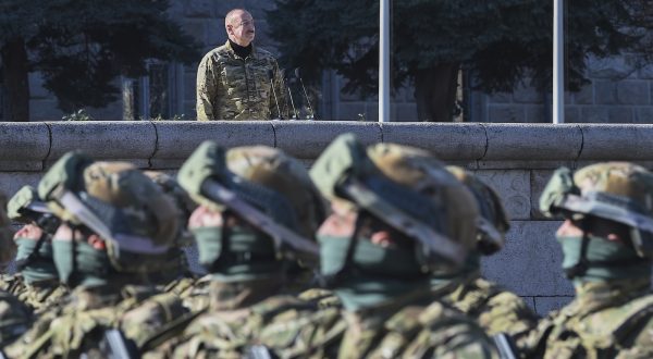 epa10963904 President of the Republic of Azerbaijan, Commander-in-Chief of the Armed Forces Ilham Aliyev, presides over a military parade marking the third anniversary of the Victory in the Patriotic War, in the former capital of Nagorno-Karabakh region, known to Armenians as Stepanakert, and in Azerbaijan as Khankendi, Azerbaijan, 08 November 2023. Azerbaijan on 19 September 2023 launched a brief military offensive in the contested region of Nagorno-Karabakh, a breakaway enclave home to some 120,000 ethnic Armenians. Following a ceasefire agreed on the following day, Azerbaijan opened all checkpoints with Armenia for the unimpeded exit of civilians from the disputed territory. The Armenian government announced the evacuation of more than 100,000 local residents from Nagorno-Karabakh, and a humanitarian center was set up in the village of Kornidzor near the so-called Lachin corridor, the main route between Armenia and the breakaway region. Nagorno-Karabakh will cease to exist as a self-proclaimed state from 01 January 2024, the region's separatist leader, Samvel Shakhramanyan, announced on 28 September 2023, after signing a decree to dissolve all its institutions.  EPA/STRINGER