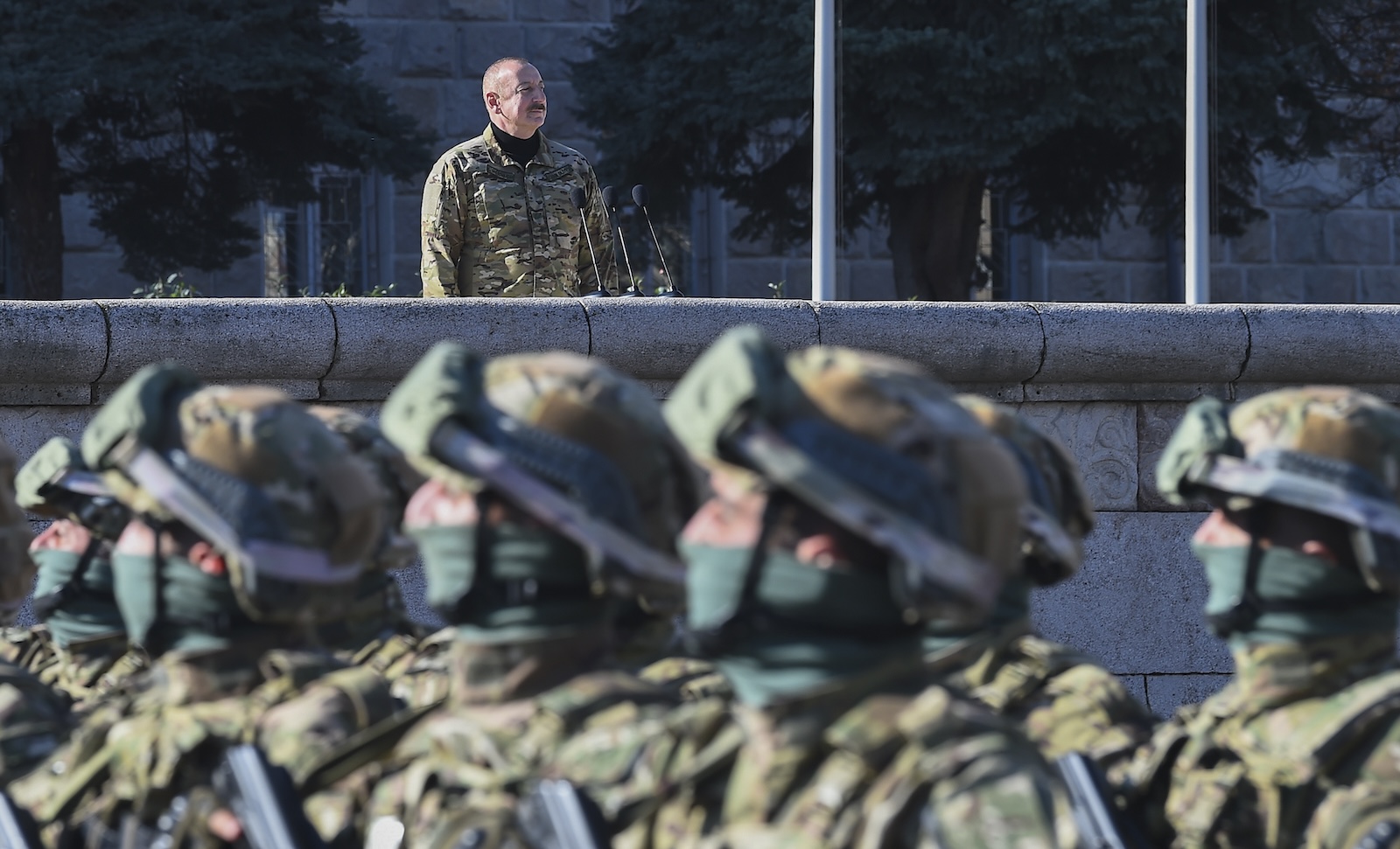epa10963904 President of the Republic of Azerbaijan, Commander-in-Chief of the Armed Forces Ilham Aliyev, presides over a military parade marking the third anniversary of the Victory in the Patriotic War, in the former capital of Nagorno-Karabakh region, known to Armenians as Stepanakert, and in Azerbaijan as Khankendi, Azerbaijan, 08 November 2023. Azerbaijan on 19 September 2023 launched a brief military offensive in the contested region of Nagorno-Karabakh, a breakaway enclave home to some 120,000 ethnic Armenians. Following a ceasefire agreed on the following day, Azerbaijan opened all checkpoints with Armenia for the unimpeded exit of civilians from the disputed territory. The Armenian government announced the evacuation of more than 100,000 local residents from Nagorno-Karabakh, and a humanitarian center was set up in the village of Kornidzor near the so-called Lachin corridor, the main route between Armenia and the breakaway region. Nagorno-Karabakh will cease to exist as a self-proclaimed state from 01 January 2024, the region's separatist leader, Samvel Shakhramanyan, announced on 28 September 2023, after signing a decree to dissolve all its institutions.  EPA/STRINGER