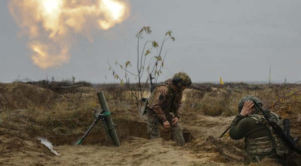 epa10964523 Ukrainian servicemen from the assault brigade 'Bureviy' (Hurricane), a unit of the Ukrainian National Guard, fire 82mm mortar during their military training ahead of their deployment to the frontline, at a shooting range north of Kyiv, Ukraine, 08 November 2023, amid the Russian invasion. The 'Bureviy' is one of nine assault brigades, part of Ukraine's 'Offensive Guard'. The Ministry of Internal Affairs of Ukraine announced in February 2023 the formation of assault brigades, which can be joined by volunteers, aimed at strengthening Ukraine's defense and 'liberating the occupied territories' from Russian forces. Russian troops entered Ukrainian territory in February 2022, starting a conflict that has provoked destruction and a humanitarian crisis.  EPA/SERGEY DOLZHENKO