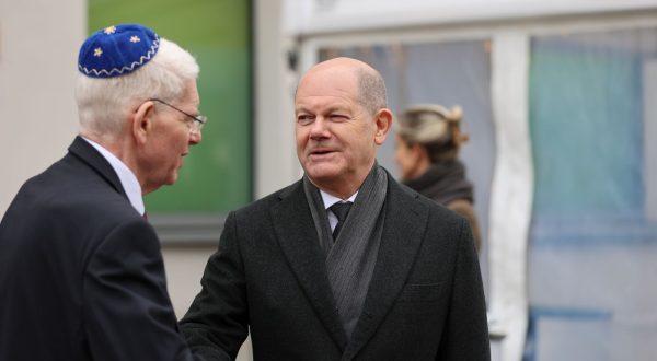 epa10966049 German Chancellor Olaf Scholz (R) and President of the Central Council of Jews in Germany Josef Schuster attend a commemoration ceremony on the 85th anniversary of the Night of Broken Glass at the Synagogue Beth Zion in Berlin, Germany, 09 November 2023. The Kristallnacht, also known as Night of Broken Glass, was a pogrom against the Jewish community that took place on the night from the 09 to the 10 of November 1938. On this night, members of the Sturmabteilung SA and Schutzstaffel SS, paramilitary forces of the National Socialist German Workers’ Party, attacked, ransacked and burnt Jewish-owned stores, buildings, and synagogues throughout Austria and Germany.  EPA/ANDREAS GORA / POOL