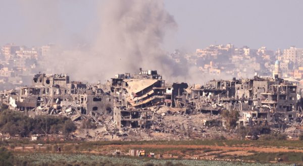 epa10969361 Smoke billows from ruined buildings in the northern part of the Gaza Strip, as seen from Sderot, Israel, 11 November 2023. More than 11,000 Palestinians and at least 1,200 Israelis have been killed, according to the Israel Defense Forces (IDF) and the Palestinian health authority, since Hamas militants launched an attack against Israel from the Gaza Strip on 07 October, and the Israeli operations in Gaza and the West Bank which followed it.  EPA/NEIL HALL