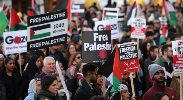 epa10970005 People participate in the Pro-Palestinian march in London, Britain, 11 November 2023. A coalition of groups are behind the march including the Palestine Solidarity Campaign, Friends of Al-Aqsa, Stop the War Coalition, Muslim Association of Britain, Palestinian Forum in Britain and Campaign for Nuclear Disarmament. The route for the march was changed to avoid any clashes with the commemorations for Armistice Day at the Cenotaph. Thousands of Israelis and Palestinians have died since the militant group Hamas launched an unprecedented attack on Israel from the Gaza Strip on 07 October, and the Israeli strikes on the Palestinian enclave which followed it.  EPA/ANDY RAIN