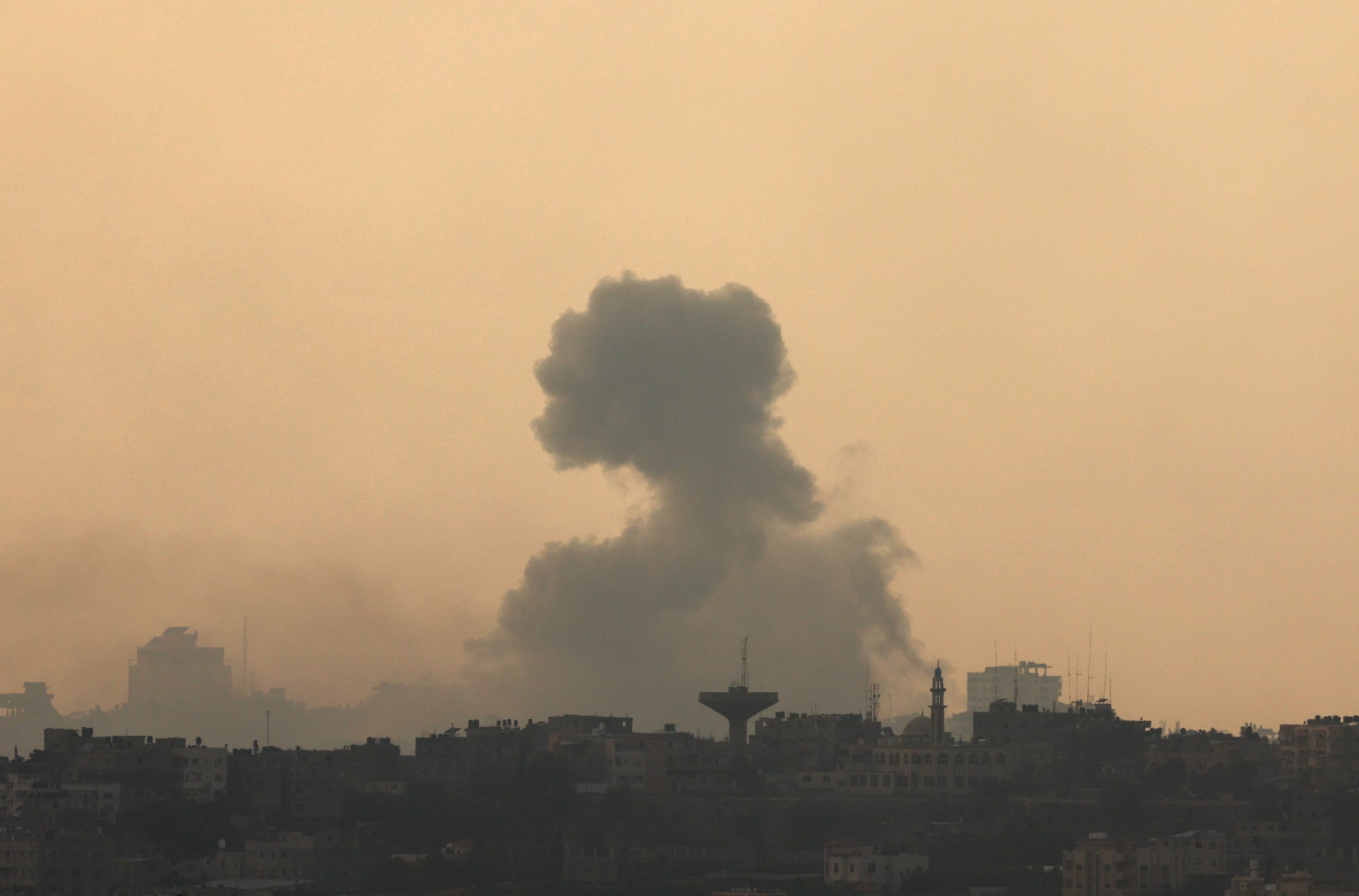 epa10974915 Smoke billows following an airstrike in the northern Gaza Strip, as seen from Sderot, southern Israel, 14 November 2023. More than 11,100 Palestinians and at least 1,200 Israelis have been killed, according to the Israel Defense Forces (IDF) and the Palestinian health authority, since Hamas militants launched an attack against Israel from the Gaza Strip on 07 October, and the Israeli operations in Gaza and the West Bank which followed it. Over the past day, the Israeli Air Force (IAF) struck 200 targets as part of its 'ground operations' in the Gaza Strip, the IDF announced on 14 November.  EPA/ATEF SAFADI