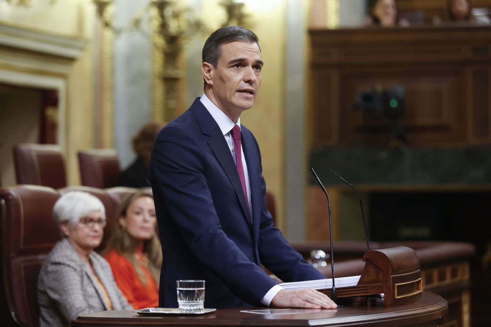 epa10975954 Spain's acting Prime Minister Pedro Sanchez delivers a speech at the Lower House of the Spanish parliament during the first day of his investiture debate in Madrid, Spain, 15 November 2023. Pedro Sanchez on 15 November faces his investiture debate in the parliament at a time of great political tension around the amnesty law. He is expected to be invested in a second term this week after PSOE party reached a deal with Catalan pro-independence party Junts per Catalunya (JxCat), led by former Catalan president Carles Puigdemont, by which Catalan separatists involved in the so-called independence 'process' in 2017 would be amnestied in exchange of the key support of seven JxCat MPs, among other concessions.  EPA/JUAN CARLOS HIDALGO