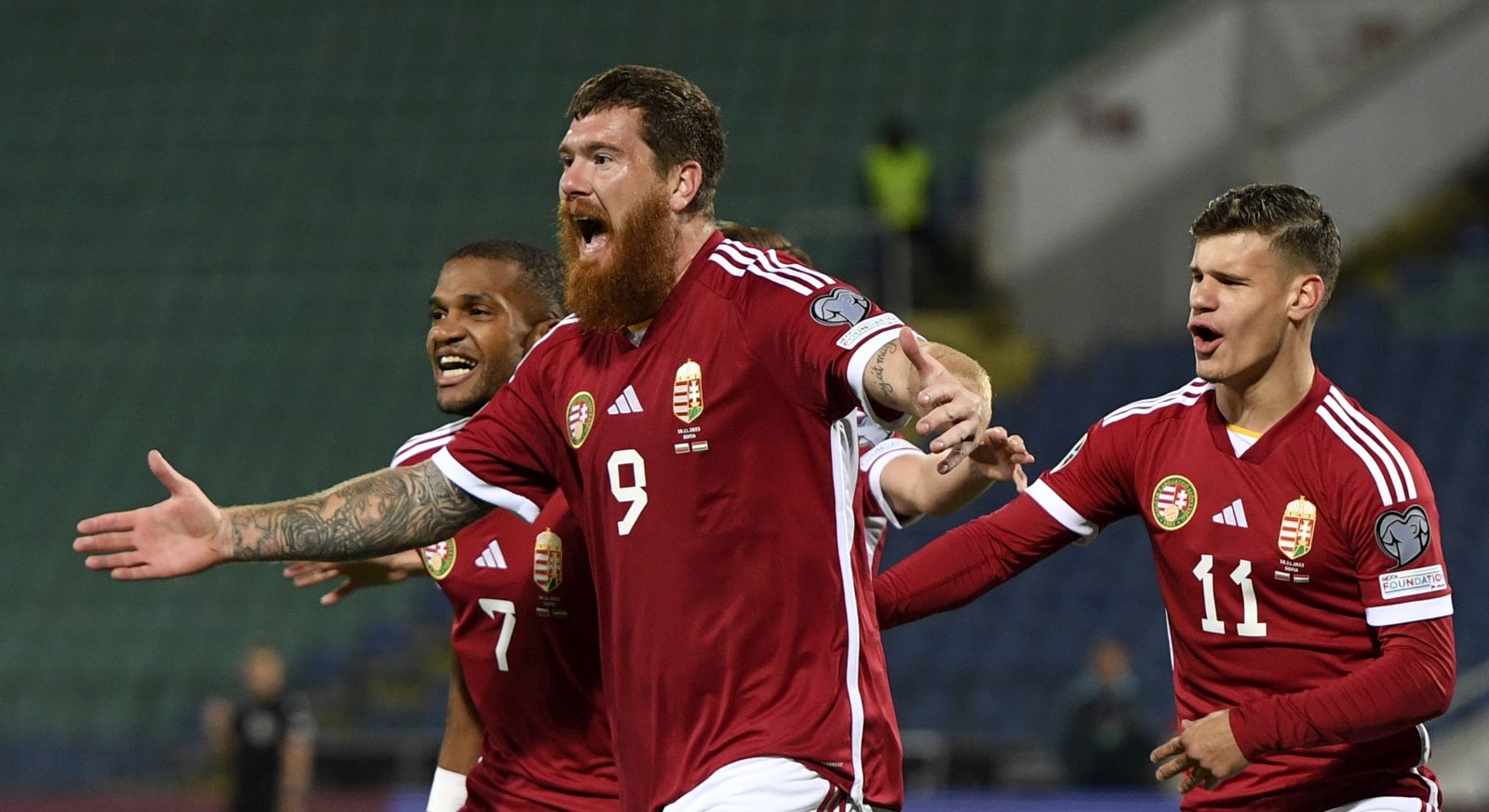 epa10978845 Martin Adam (C) of Hungary celebrates after scoring the 0-1 goal during the UEFA EURO 2024 Group G qualification match between Bulgaria and Hungary in Sofia, Bulgaria, 16 November 2023.  EPA/VASSIL DONEV