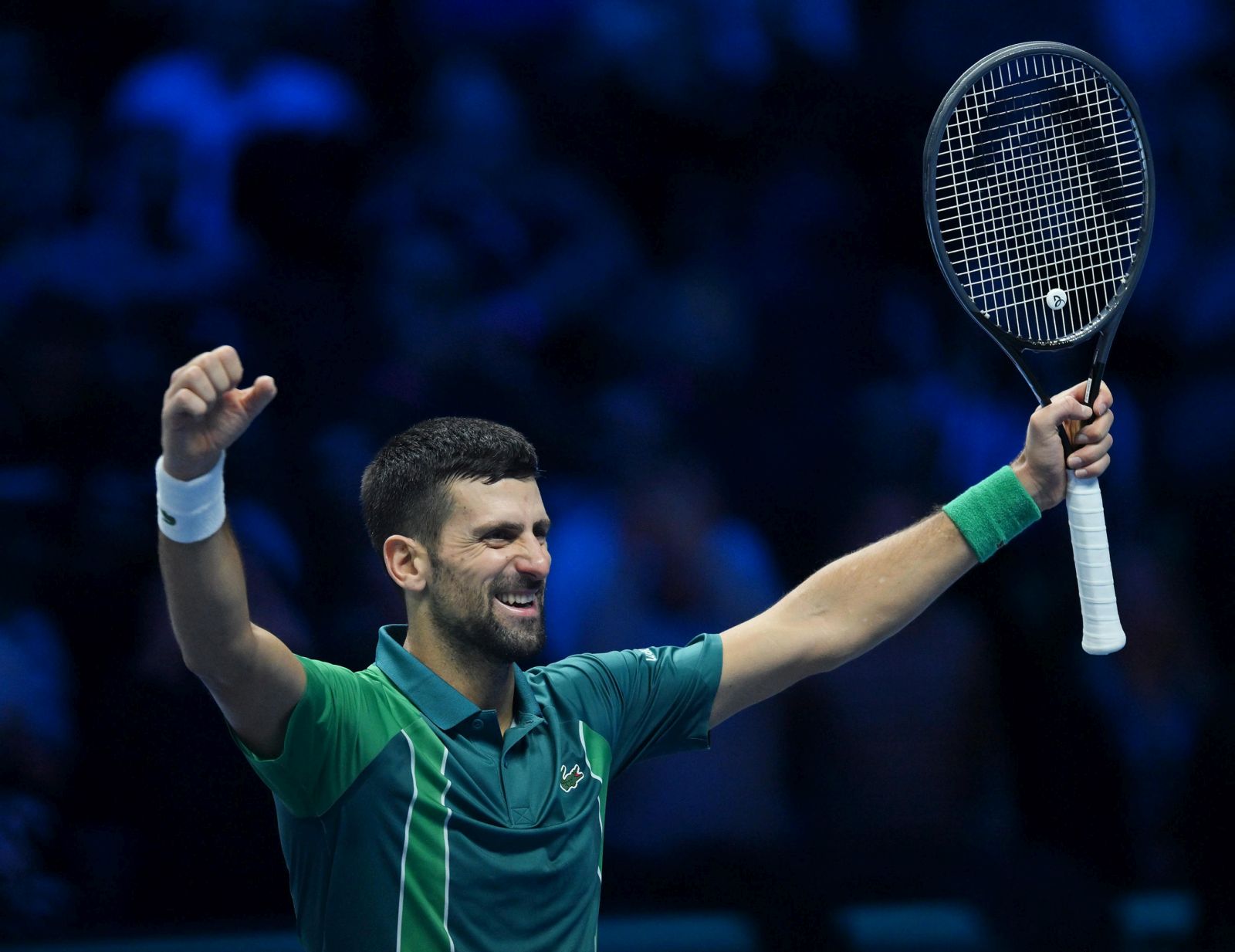 epa10985354 Novak Djokovic of Serbia celebrates winning his singles finals match against Jannik Sinner of Italy at the Nitto ATP Finals tennis tournament in Turin, Italy, 19 November 2023.  EPA/ALESSANDRO DI MARCO