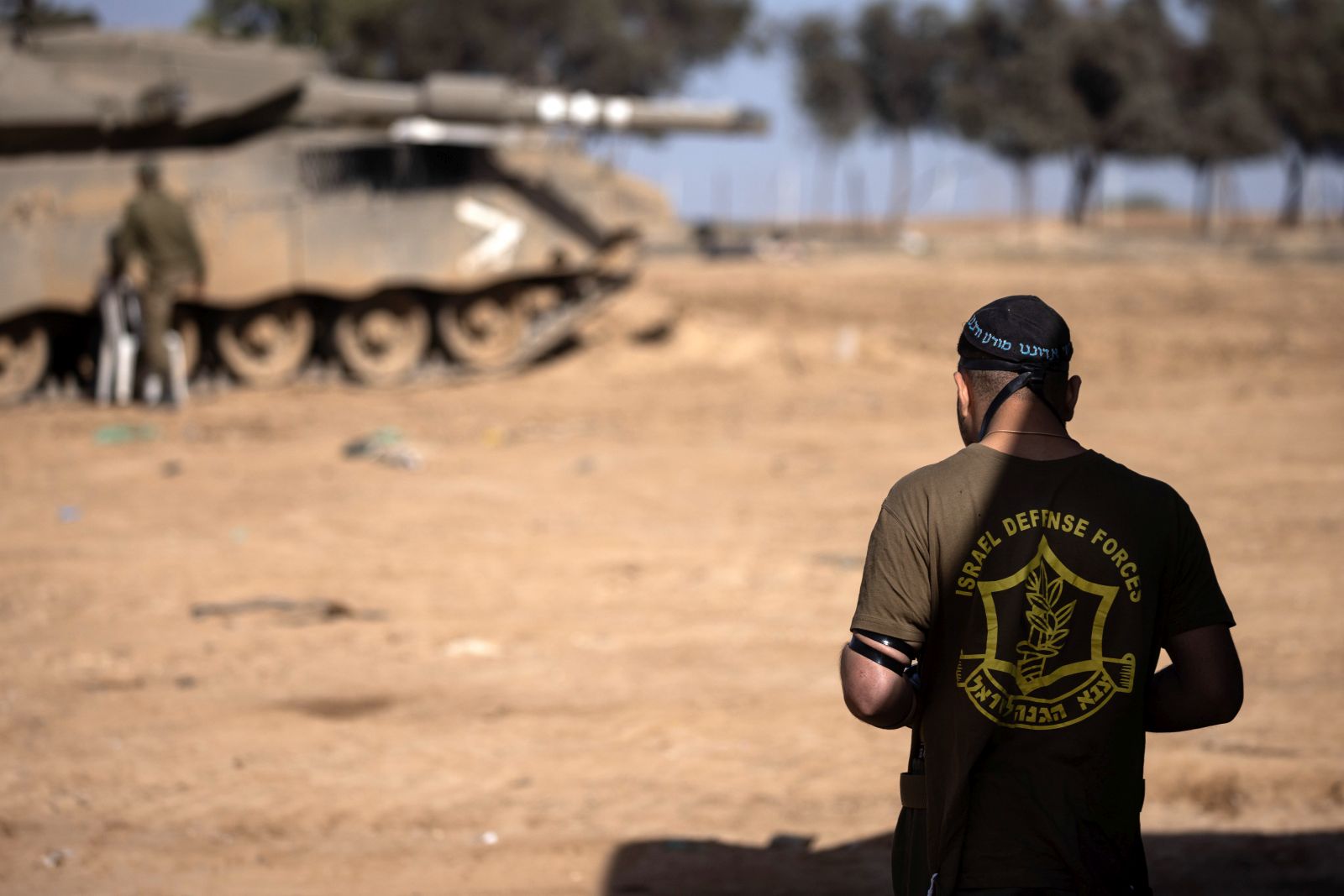 epa10992060 An Israeli soldier recites prayers at the border with the Gaza Strip, in southern Israel, 24 November 2023. Israel and Hamas agreed to a 4-day ceasefire agreement, mediated by Qatar, the US, and Egypt, that came into effect at 05:00 AM GMT on 24 November, with 50 Israeli hostages, women and children, to be released by Hamas. And 150 Palestinian women and children that were detained in Israeli prisons to be released in exchange. More than 14.000 Palestinians and at least 1,200 Israelis have been killed, according to the Gaza Government media office and the Israel Defense Forces (IDF), since Hamas militants launched an attack against Israel from the Gaza Strip on 07 October, and the Israeli operations in Gaza and the West Bank which followed it.  EPA/CHRISTOPHE PETIT TESSON