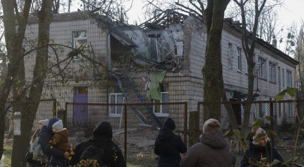 epa10993820 People view the rubble of a kindergarten damaged during drone strikes in Kyiv, Ukraine 25 November 2023. Ukraine's Air Force Command of the Armed Forces said it downed 71 of 75 drones in an overnight attack, 25 November, in what Kyiv authorities called the most intense attack on the capital since the start of the invasion.  Russian troops entered Ukrainian territory in February 2022, starting a conflict that has provoked destruction and a humanitarian crisis.  EPA/SERGEY DOLZHENKO