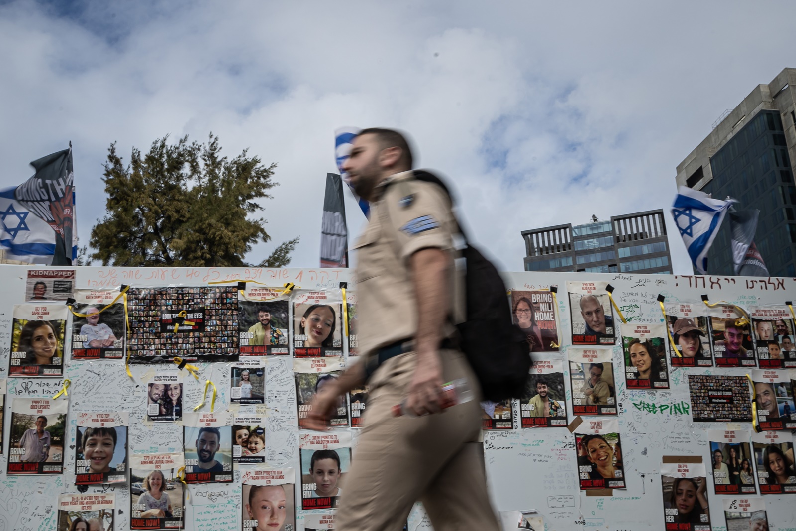 epa10997384 Portraits of people abducted by Hamas militants displayed on a installation held by the ‘Bring Them Home Now’ organisation to support the families of hostages and call for their release, outside the Tel Aviv museum in Tel Aviv, Israel, 27 November 2023. More than 14,000 Palestinians and at least 1,200 Israelis have been killed, according to the Gaza Government media office and the Israel Defense Forces (IDF), since Hamas militants launched an attack against Israel from the Gaza Strip on 07 October, and the Israeli operations in Gaza and the West Bank which followed it.  EPA/CHRISTOPHE PETIT TESSON