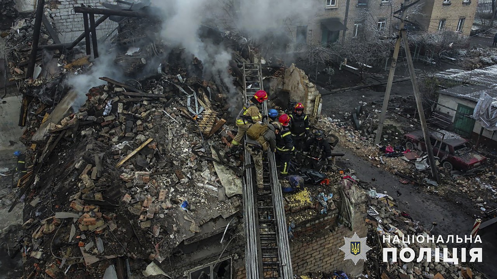 epa11003426 A handout photo made available by the National Police of Ukraine shows Ukrainian rescuers working at the site of a missile attack in the city of Novogrodivka, Donetsk region, eastern Ukraine, 30 November 2023, amid the Russian invasion. At least one person died, 10 people were injured, including 4 children and four more people are being searched under the rubble according to the National Police report. Russian troops entered Ukrainian territory in February 2022, starting a conflict that has provoked destruction and a humanitarian crisis.  EPA/NATIONAL POLICE OF UKRAINE HANDOUT HANDOUT  HANDOUT EDITORIAL USE ONLY/NO SALES HANDOUT EDITORIAL USE ONLY/NO SALES