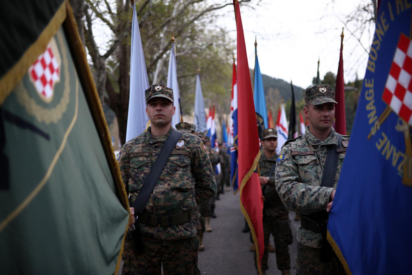 11.04.2023., Mostar, Bosna i Hercegovina - Drugi dio svecane proslave 31. obljetnice utemeljenja HVO-a i 18. obljetnice 1. pjesacke pukovnije OS BiH zapoceo je svecanom svetom misom u mostarskoj Katedrali, nakon cega je uslijedio vojni mimohod ulicama Mostara do sredisnjeg spomenika ispred hrvatskog Doma herceg Stjepan kosaca gdje su izaslanstva HNS-a i braniteljskih udruga HVO-a polozila vijence i zapalila svijece.  Photo: Denis Kapetanovic/PIXSELL