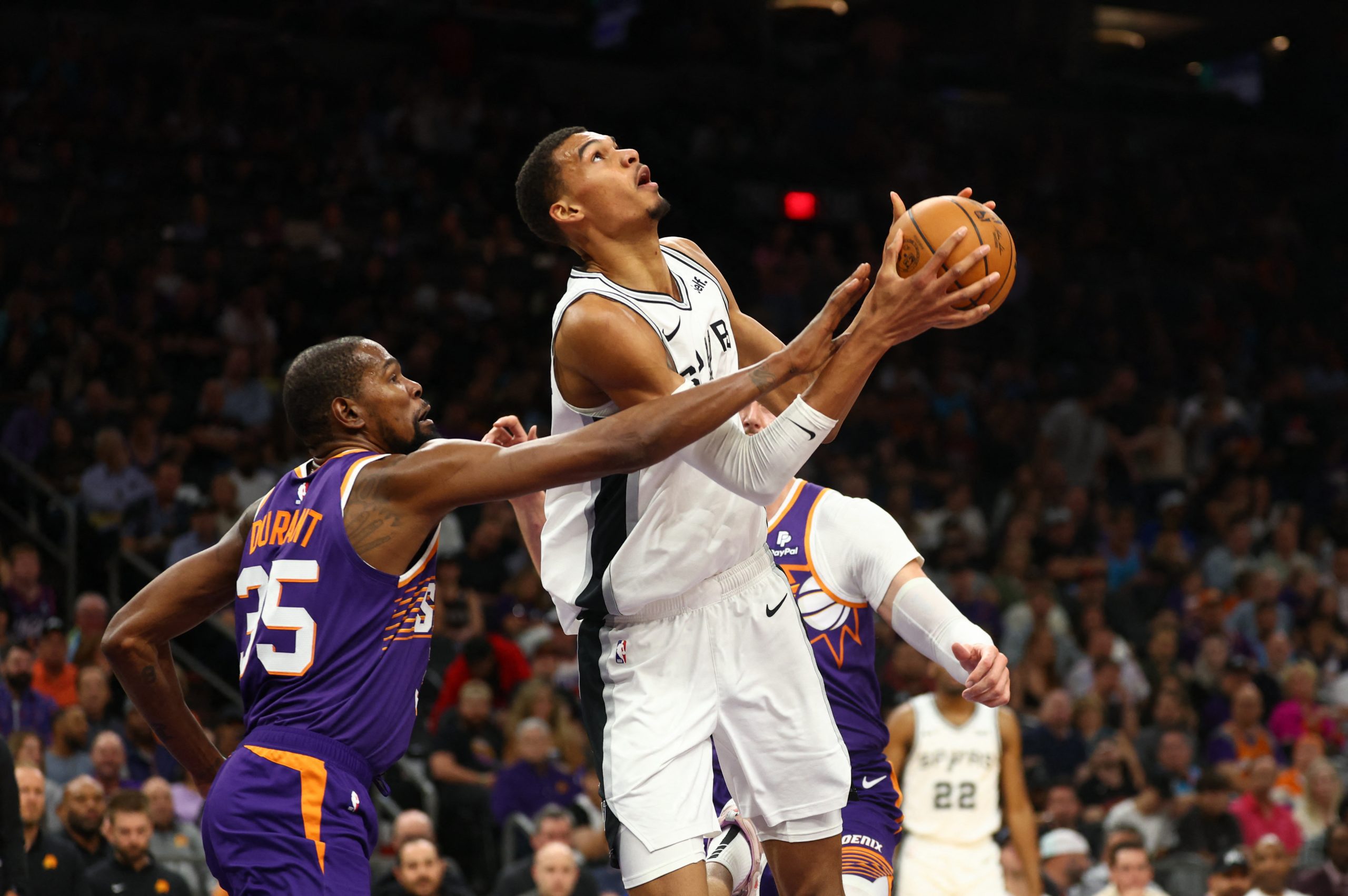 Nov 2, 2023; Phoenix, Arizona, USA; San Antonio Spurs center Victor Wembanyama (1) drives to the basket against Phoenix Suns forward Kevin Durant (35) in the second half at Footprint Center. Mandatory Credit: Mark J. Rebilas-USA TODAY Sports Photo: Mark J. Rebilas/REUTERS