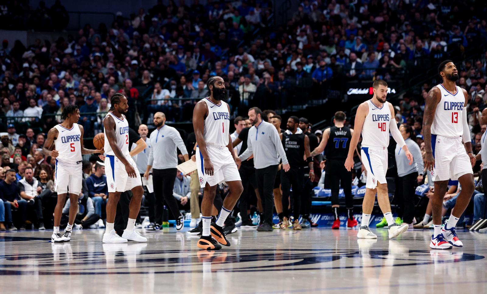 Nov 10, 2023; Dallas, Texas, USA;  LA Clippers guard Bones Hyland (5) and LA Clippers forward Kawhi Leonard (2) and LA Clippers guard James Harden (1) and LA Clippers center Ivica Zubac (40) and LA Clippers forward Paul George (13) react during the second half against the Dallas Mavericks at American Airlines Center. Mandatory Credit: Kevin Jairaj-USA TODAY Sports Photo: Kevin Jairaj/REUTERS