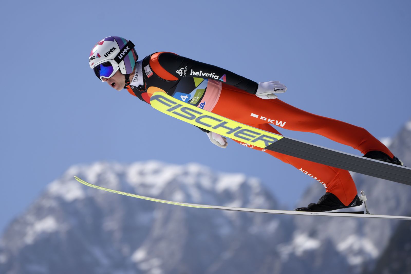Simon Ammann, of Switzerland, soars through the air during his first round jump in the Men Flying Hill Team competition at the FIS Ski Jumping World Cup in Planica, Slovenia, Saturday, March 26, 2022. (AP Photo/Darko Bandic)
