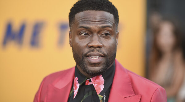 FILE - Kevin Hart appears at the premiere of "Me Time" in Los Angeles on Aug. 23, 2022. The satellite radio company announced Wednesday that it has signed Hart and his entertainment company, Hartbeat, to a multi-year deal. As part of the deal, the superstar actor-comedian continue to curate content involving comedy and culture on his Laugh Out Loud Radio channel. (Photo by Richard Shotwell/Invision/AP, File)