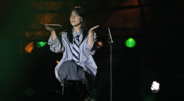 Billie Eilish performs during the Power Our Planet concert on the sideline of the Climate Finance conference in Paris, Thursday, June 22, 2023. World leaders, heads of international organisations and activists are gathering in Paris for a two-day summit aimed at seeking better responses to tackle poverty and climate change issues by reshaping the global financial system. (AP Photo/Lewis Joly)