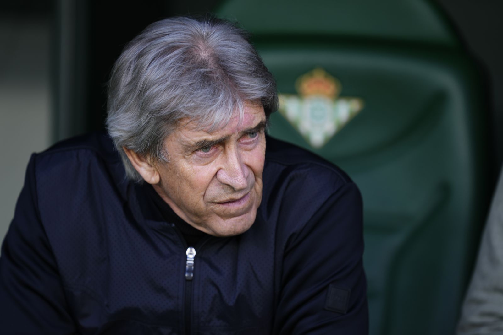 Betis' head coach Manuel Pellegrini waits for the start of a Spanish La Liga soccer match between Betis and Real Madrid at the Benito Villamarin stadium in Seville, Spain, Saturday, Dec. 9, 2023. (AP Photo/Jose Breton)