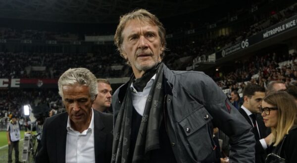 FILE - Sir Jim Ratcliffe looks on ahead of the French League One soccer match between Nice and Paris Saint Germain in Allianz Riviera stadium in Nice, southern France, on Oct.18, 2019. More than a year after it was put up for sale, Manchester United said Sunday that British billionaire Jim Ratcliffe had agreed to buy a minority stake in the storied Premier League club. Ratcliffe, who owns petrochemicals giant INEOS and is one of Britain’s richest people, has bought a stake of “up to 25%” of the 20-time league champions and will invest $300 million in its Old Trafford stadium. (AP Photo/Daniel Cole, File)